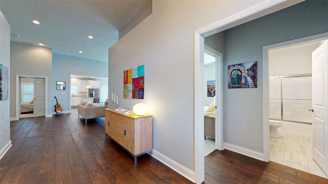 hallway featuring dark wood-type flooring