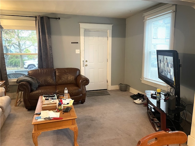 carpeted living room featuring a wealth of natural light