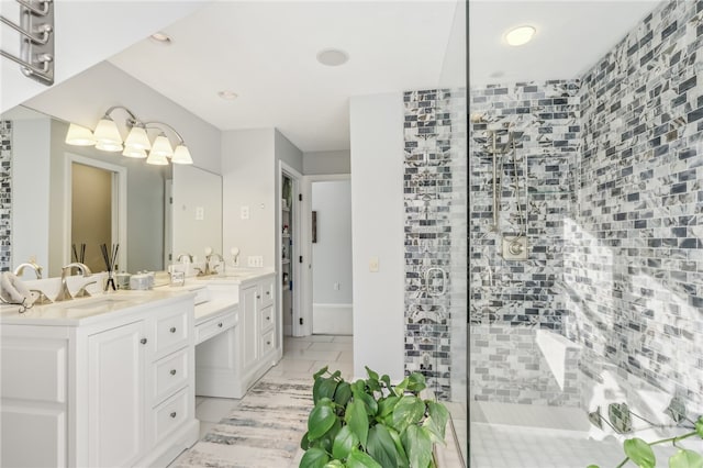 bathroom with vanity and an enclosed shower