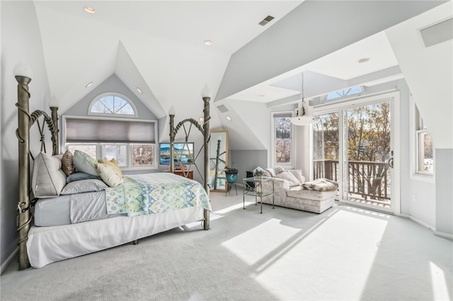 bedroom with carpet flooring, lofted ceiling, and access to outside