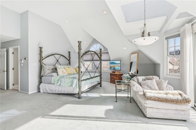 carpeted bedroom with vaulted ceiling