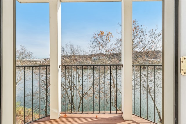 balcony featuring a water view