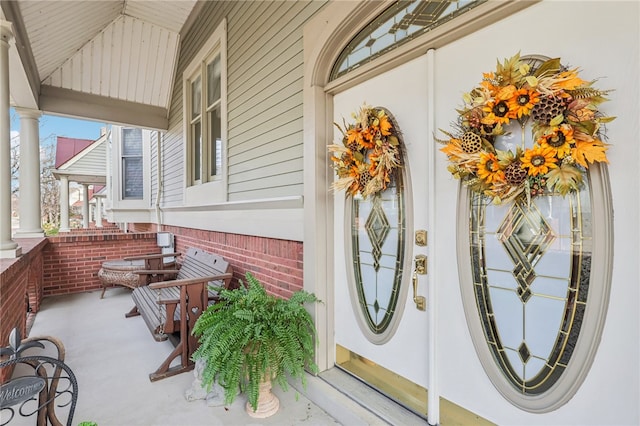 property entrance with a porch