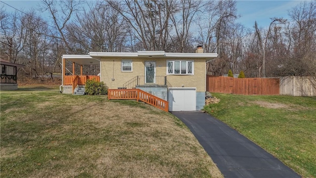 view of front of property with a front lawn