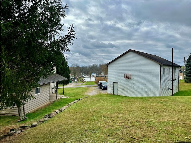 view of home's exterior with a yard