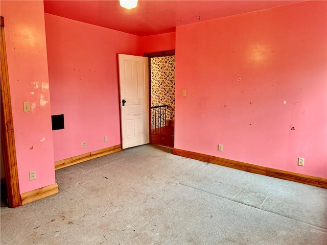 unfurnished room with carpet floors