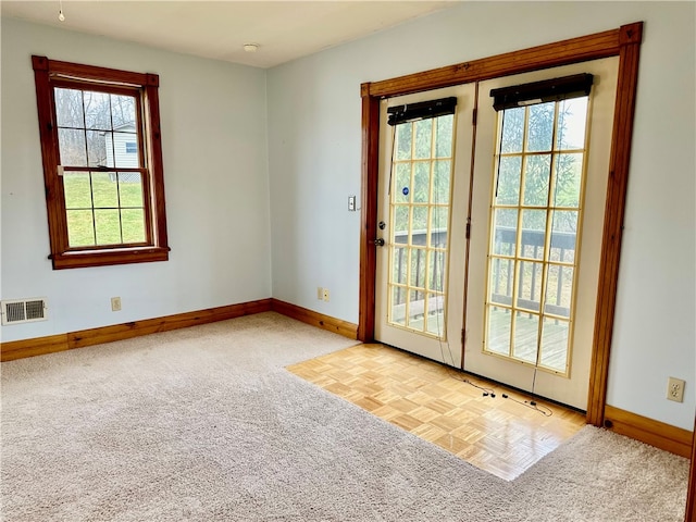 entryway featuring light parquet floors