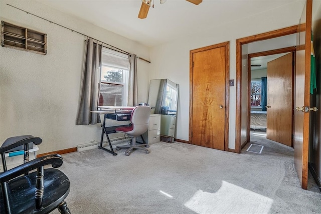 office area featuring ceiling fan and carpet floors