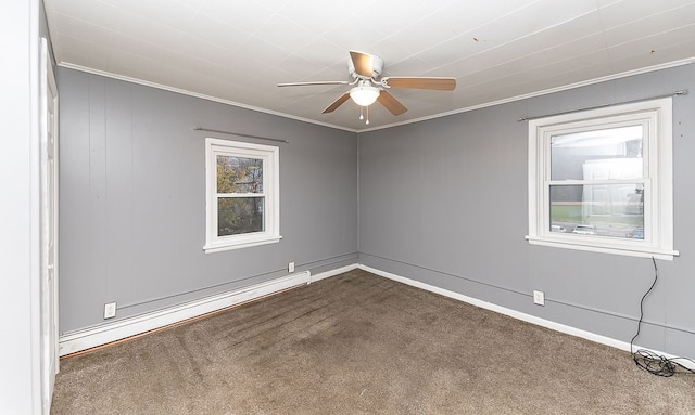 carpeted spare room with ceiling fan, crown molding, and a baseboard radiator