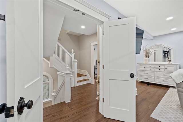 interior space with vanity and wood-type flooring