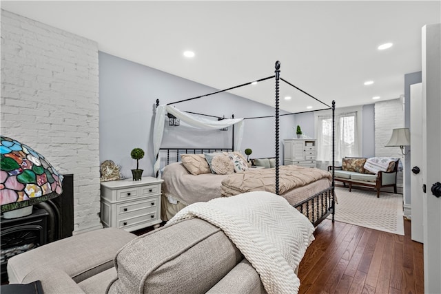 bedroom featuring dark wood-type flooring