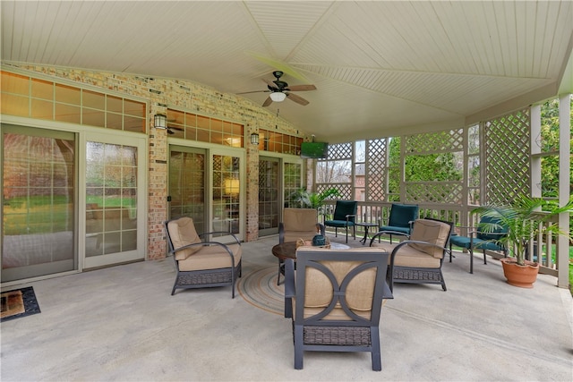 view of patio featuring ceiling fan