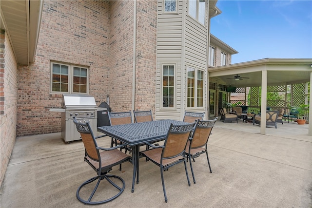 view of patio / terrace with outdoor lounge area, ceiling fan, and grilling area