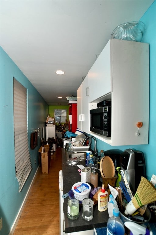 dining area with light hardwood / wood-style floors