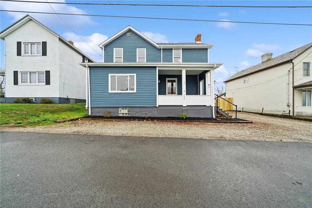 view of property featuring a porch