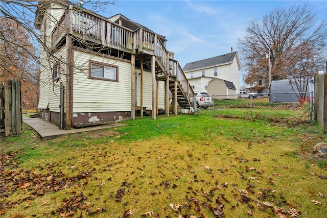 exterior space with a yard and a wooden deck