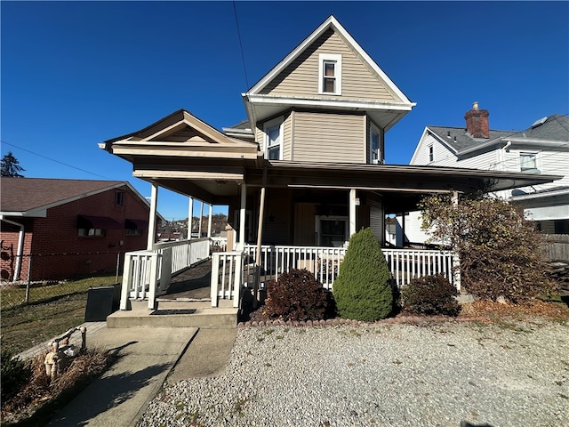 view of front of property featuring covered porch