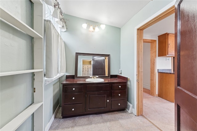 bathroom with vanity and tile patterned floors