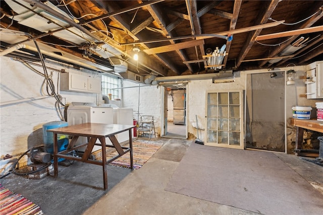 basement featuring washer and dryer