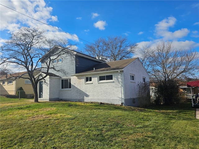 exterior space with a yard