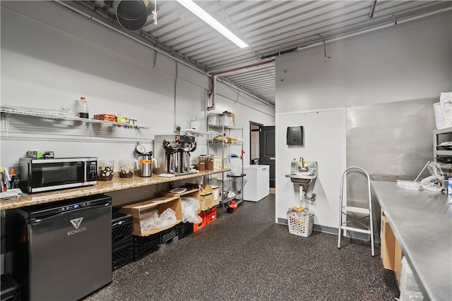 kitchen featuring washer / clothes dryer