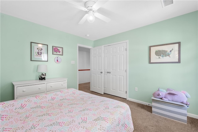 bedroom featuring carpet, a closet, and ceiling fan