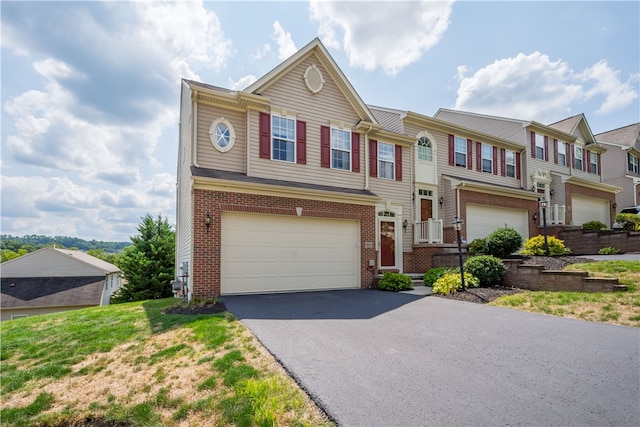 multi unit property featuring a garage