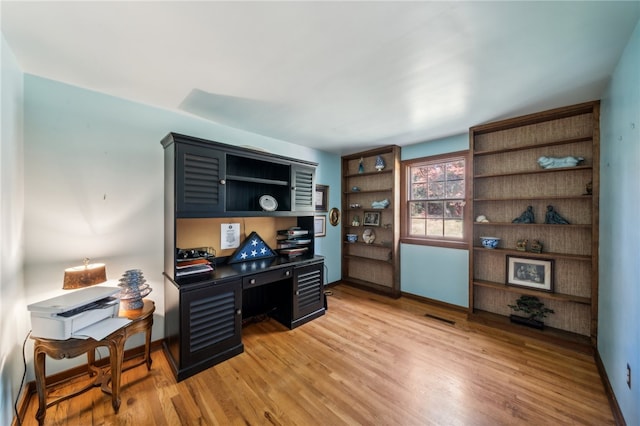 office featuring light hardwood / wood-style floors