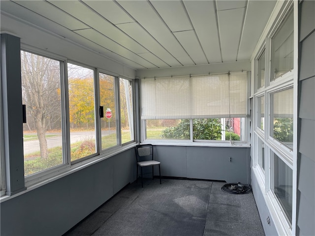 unfurnished sunroom with a healthy amount of sunlight