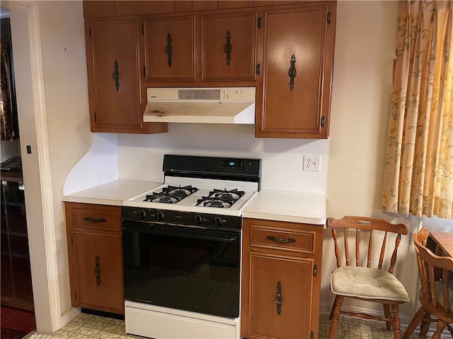 kitchen with white stove