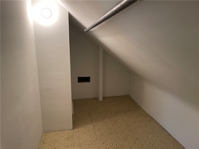 bonus room with lofted ceiling