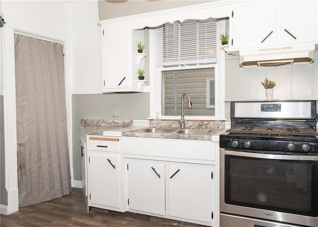 kitchen with white cabinetry, stainless steel range with gas cooktop, dark hardwood / wood-style floors, and sink