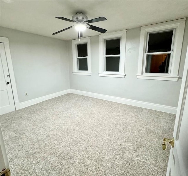 unfurnished room with ceiling fan