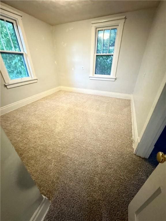 view of carpeted spare room