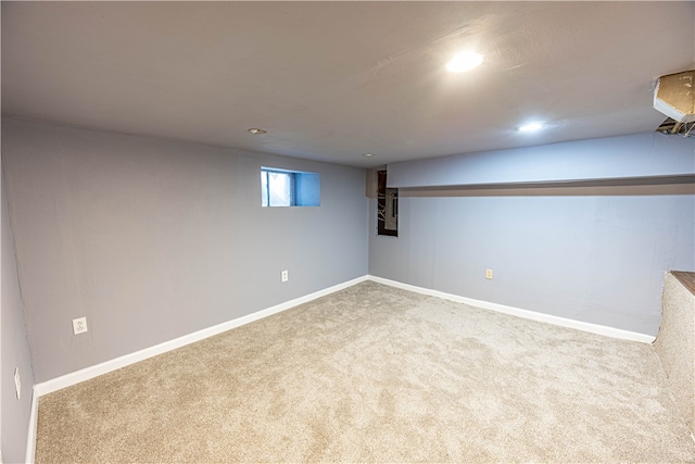 basement featuring carpet flooring