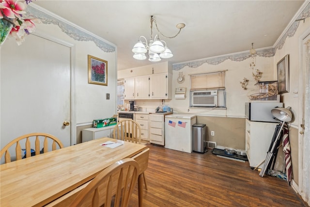 kitchen with cooling unit, hanging light fixtures, dark hardwood / wood-style floors, and a notable chandelier