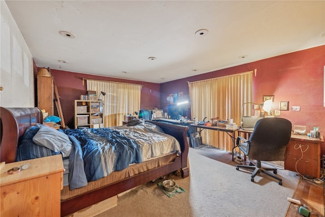 bedroom featuring carpet