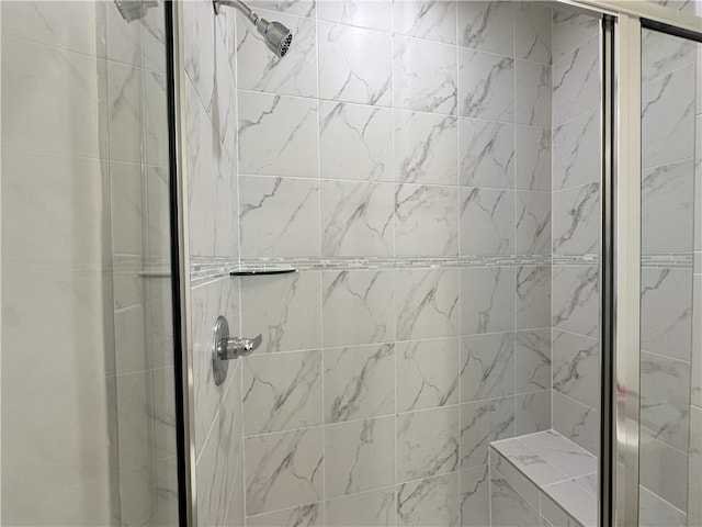 bathroom with an enclosed shower