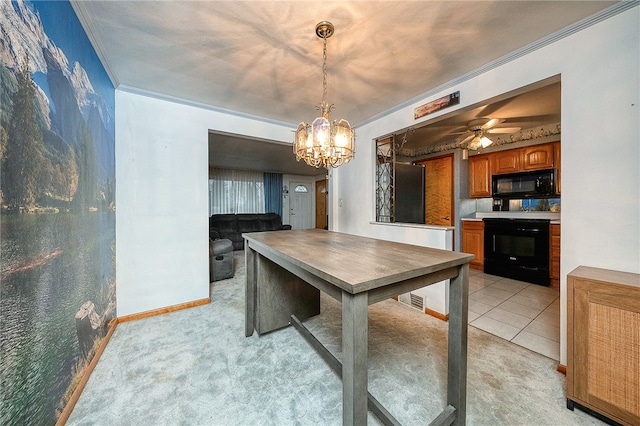 dining room with light carpet, ceiling fan with notable chandelier, and ornamental molding