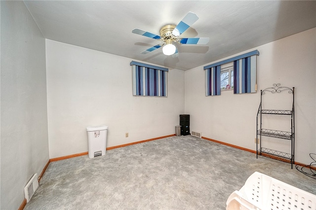 carpeted empty room with ceiling fan