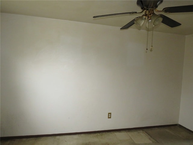 spare room with ceiling fan and light colored carpet