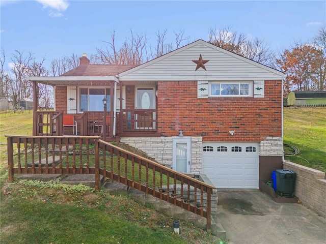 view of front facade with a porch, a garage, and a front yard