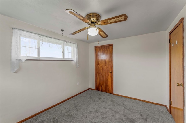 unfurnished bedroom with carpet and ceiling fan