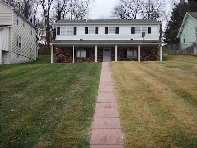 view of front facade with a front lawn