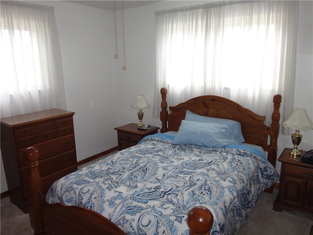 bedroom featuring carpet