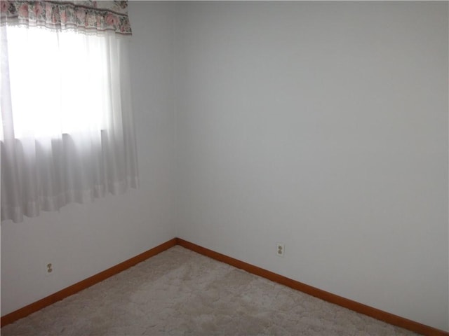 207 Ann St, Brownsville, PA 15414 - spare room with baseboards and light colored carpet