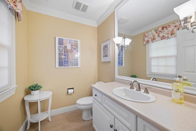 bathroom featuring tile patterned floors, ornamental molding, vanity, a notable chandelier, and toilet