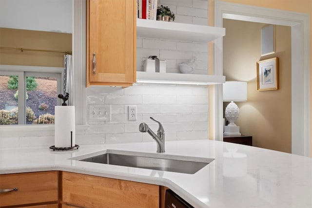 kitchen with decorative backsplash and sink