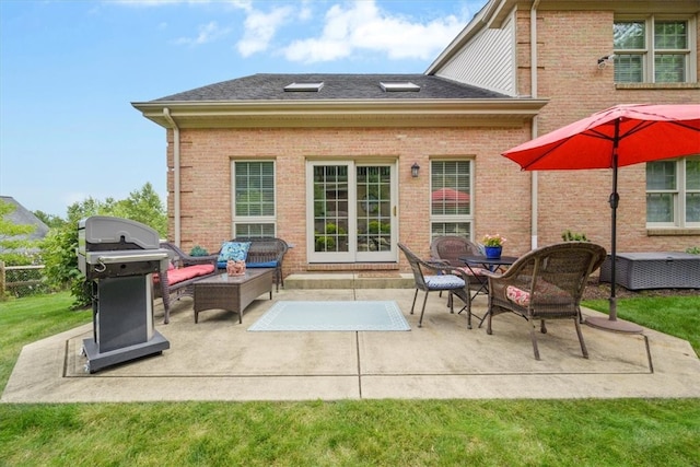 back of property featuring outdoor lounge area, a patio area, and a yard