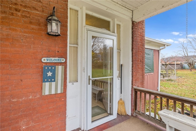 entrance to property with covered porch